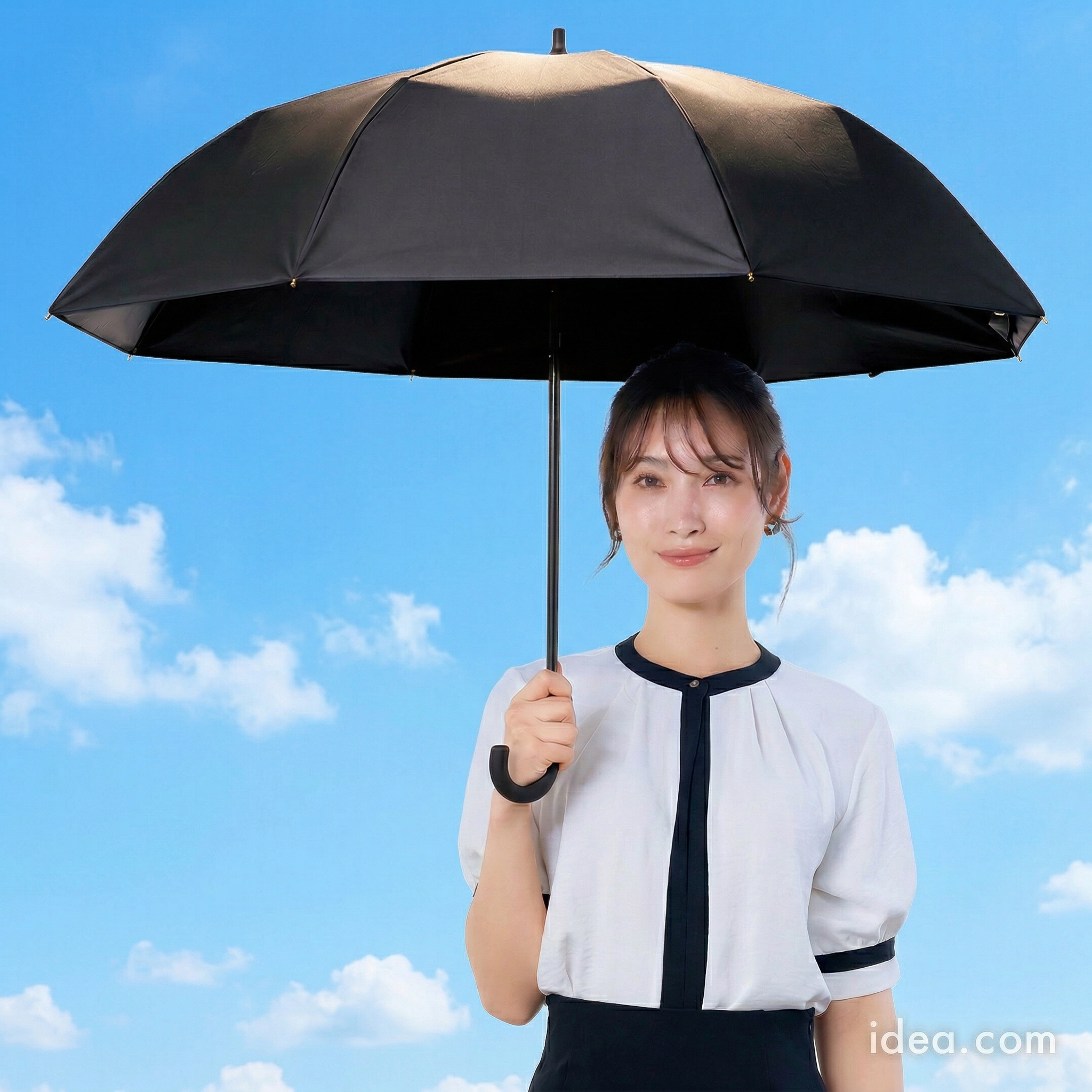 日傘・アームカバー・ケープ 3点を並べた俯瞰写真